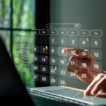 Calendar,Planner,,Businessman,Using,Laptop,To,Highlight,Appointment,Reminders,And
